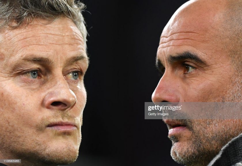 Ole Gunnar Solskjaer, Manager of Manchester United (L) and Josep Guardiola, Manager of Manchester City